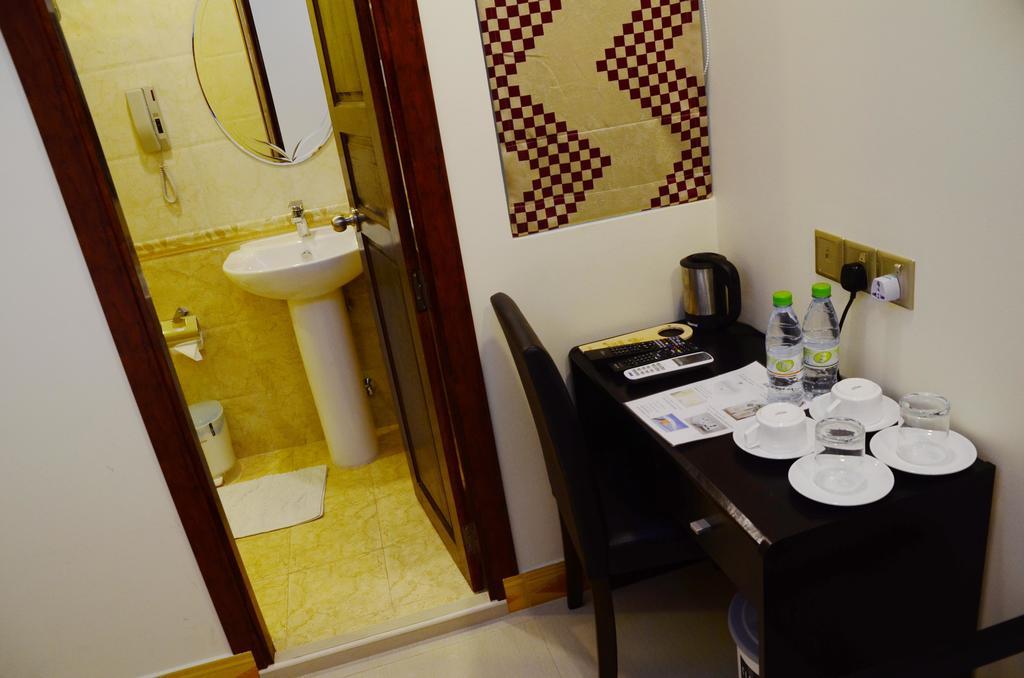 Hotel The Melrose à Malé Chambre photo